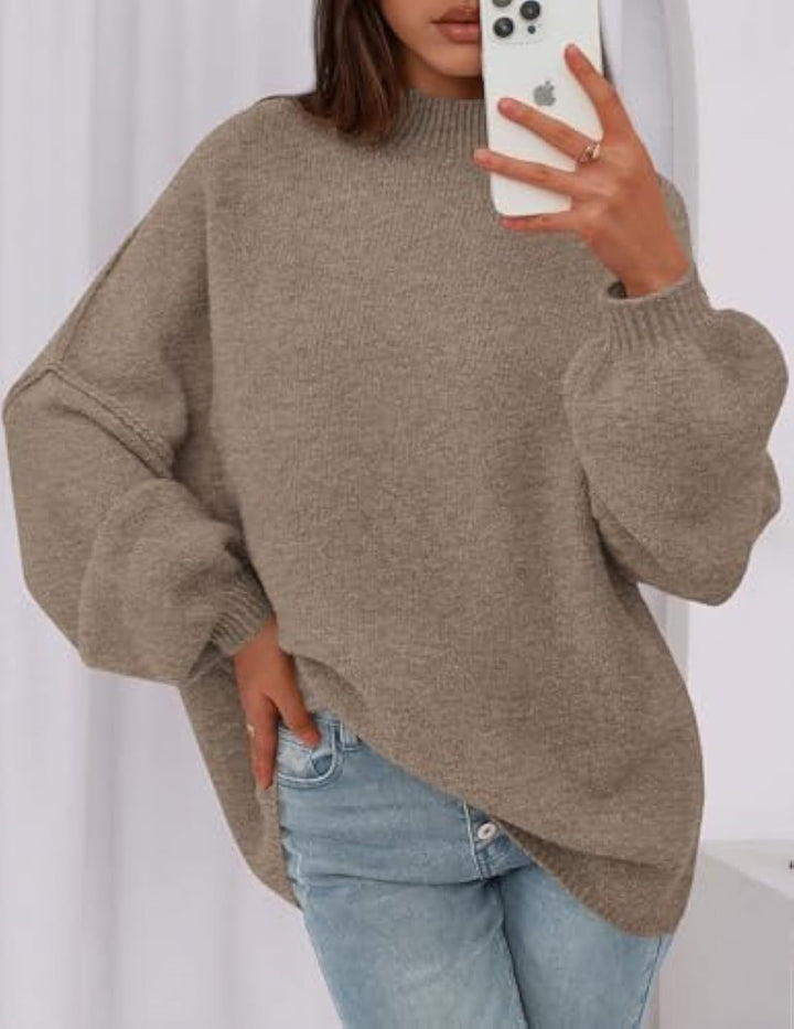Ladies oversized knitted pullover with stand-up collar and balloon sleeves Drune