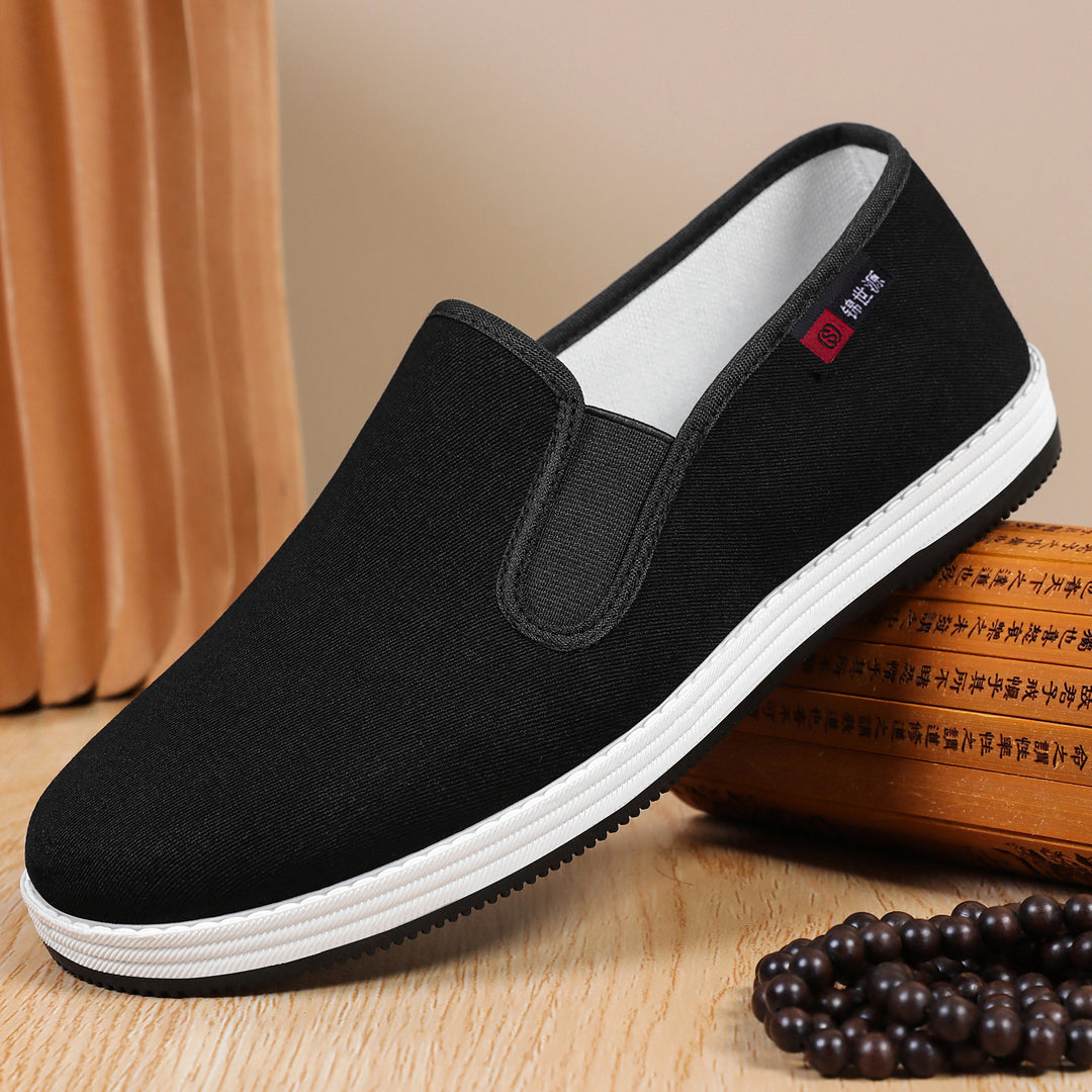 Men's lightweight canvas slip-on casual shoe with elastic entry, padded insole, and grippy rubber outsole Mune Fashion