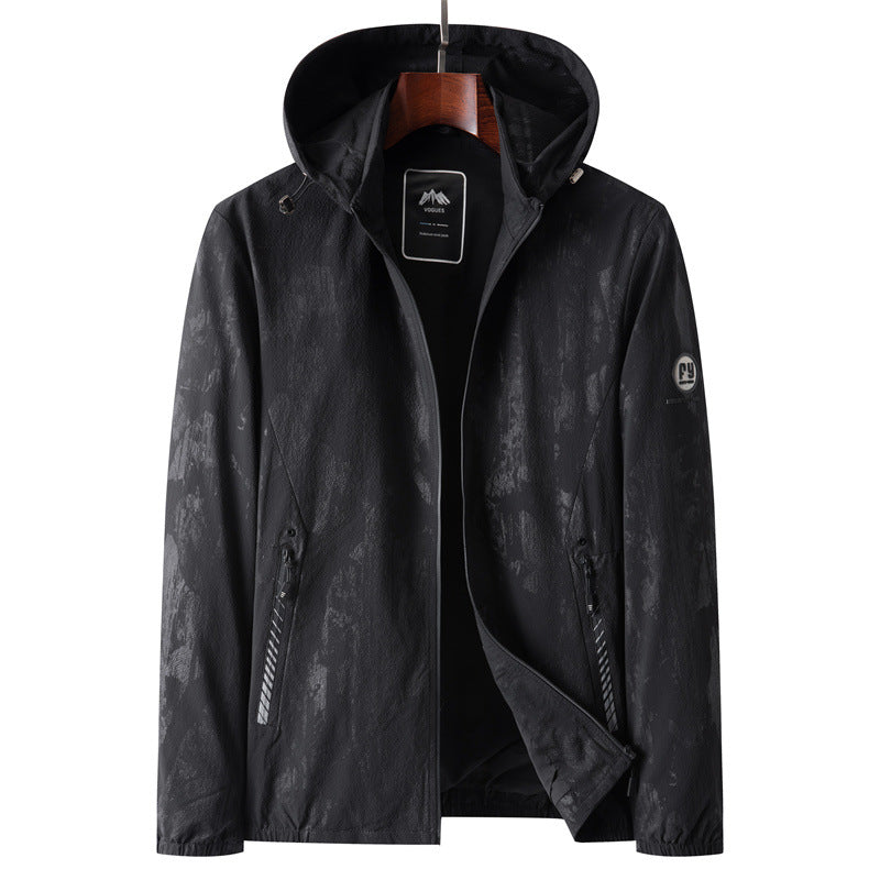Men's lightweight softshell transitional jacket with hood, water-repellent coating and reflective zippered pockets Mune Fashion