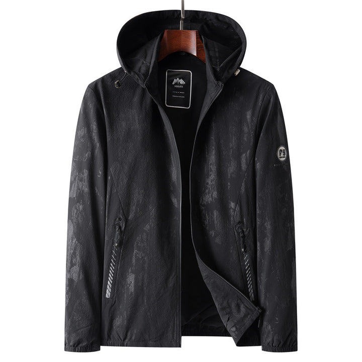 Men's lightweight softshell transitional jacket with hood, water-repellent coating and reflective zippered pockets Mune Fashion