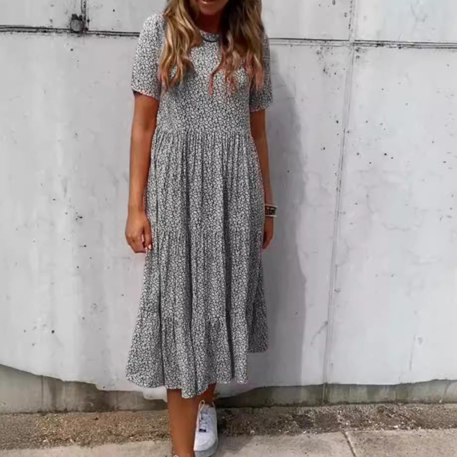 Women's floral crinkled midi dress with gathered empire waist, short sleeves, and tiered ruffle skirt Mune Fashion