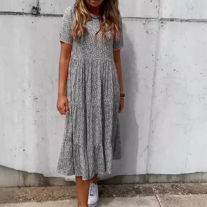 Women's floral crinkled midi dress with gathered empire waist, short sleeves, and tiered ruffle skirt Mune Fashion