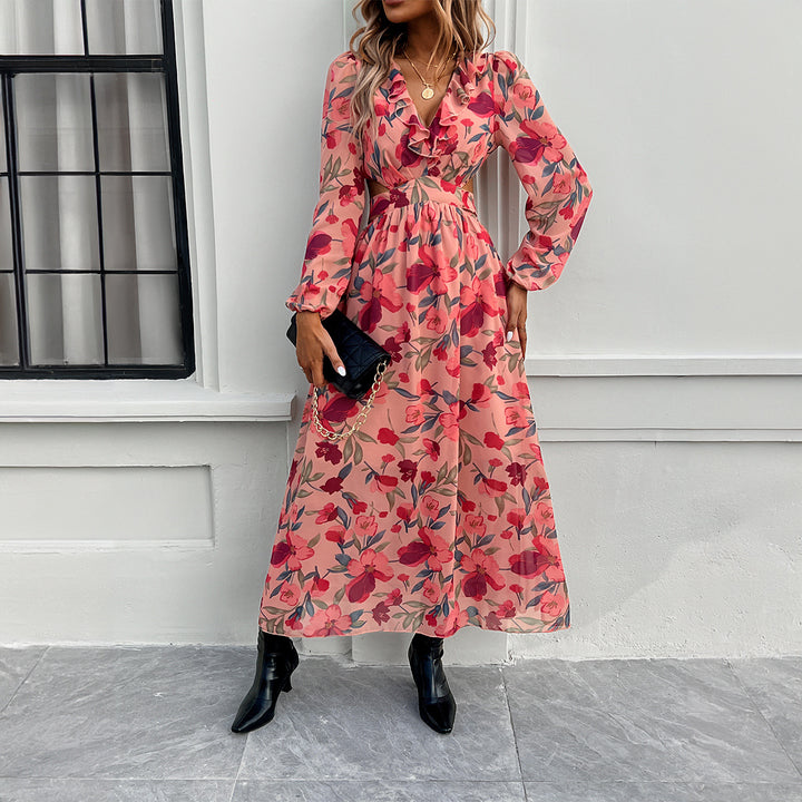 Ladies airy flowing chiffon maxi dress with waist cutouts, ruffled V-neckline and long, sheer sleeves Mune Fashion