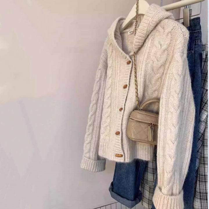Women's hooded cardigan with cable knit, wooden button placket, and boxy silhouette Mune Fashion