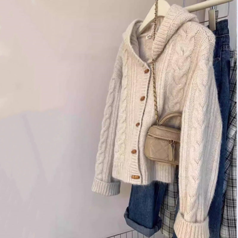 Women's hooded cardigan with cable knit, wooden button placket, and boxy silhouette Mune Fashion