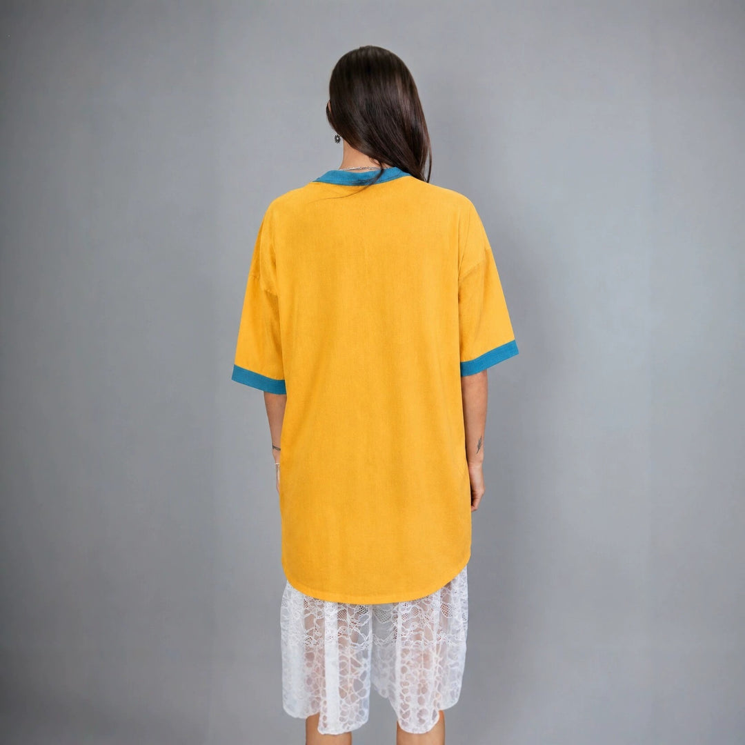 Women's oversized polo tunic with contrast collar and patch breast pockets Mune Fashion