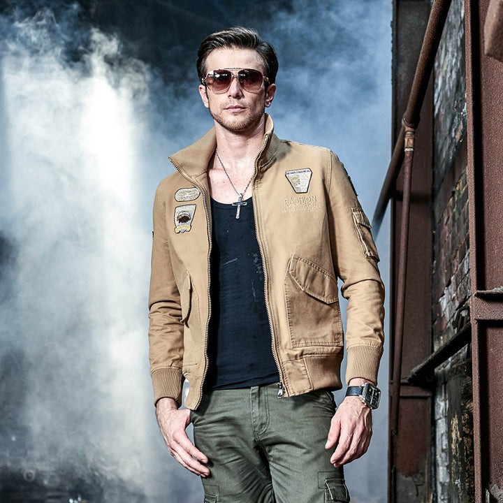 Men's nan field bomber jacket in pilot style with embroidered emblems, ribbed collar, and multifunctional arm pocket Mune Fashion