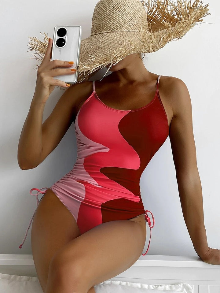 Women's one-piece swimsuit with playful cut-outs and floral design Mune Fashion