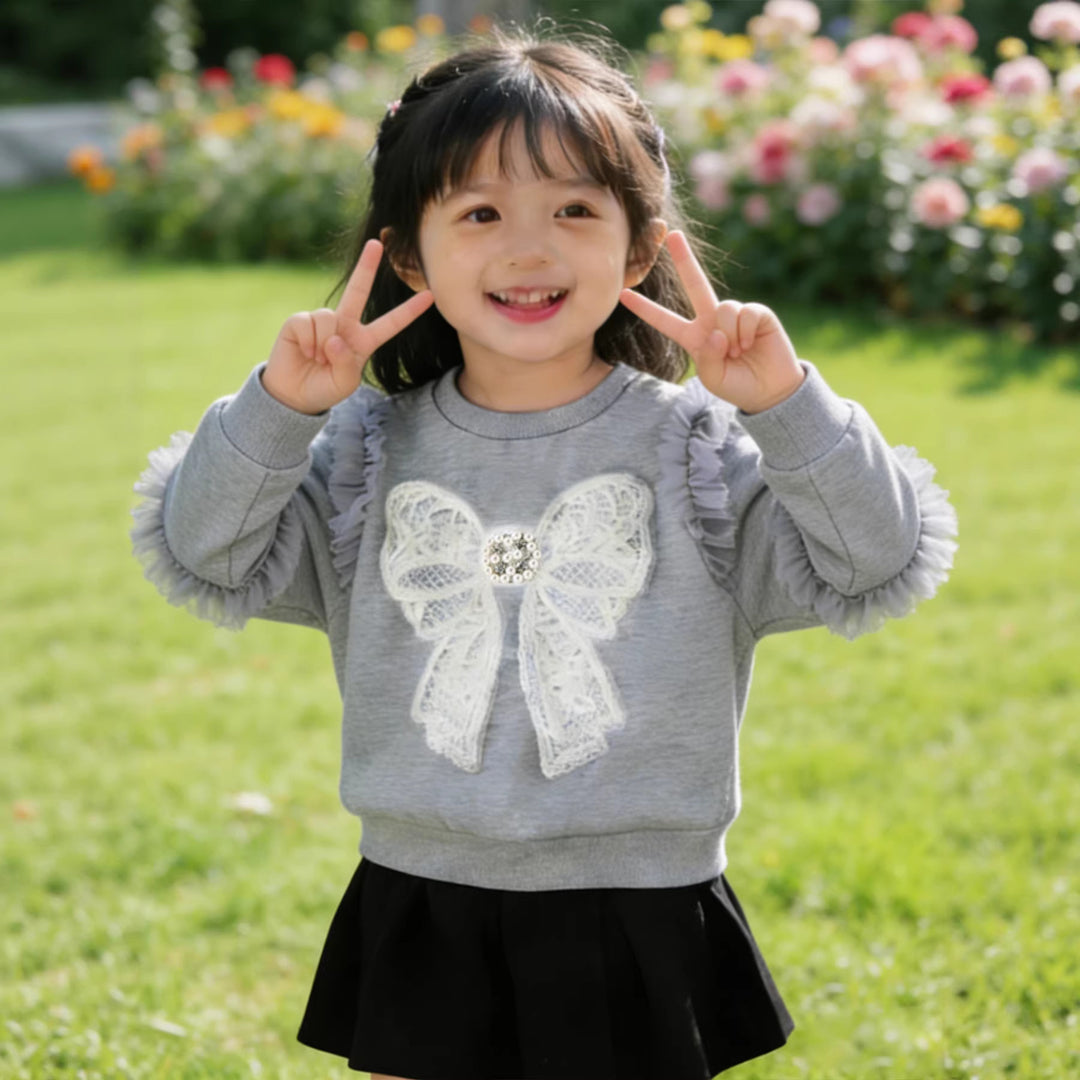 Girl sweatshirt with ruffle details and decorative bow motif Mune Fashion