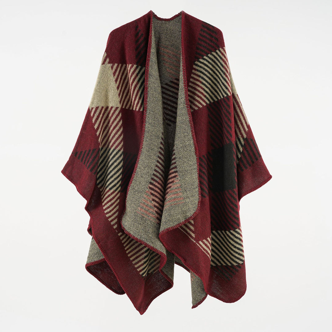 Women’s cape poncho made of wool blend with geometric striped jacquard and open edge seam Mune Fashion