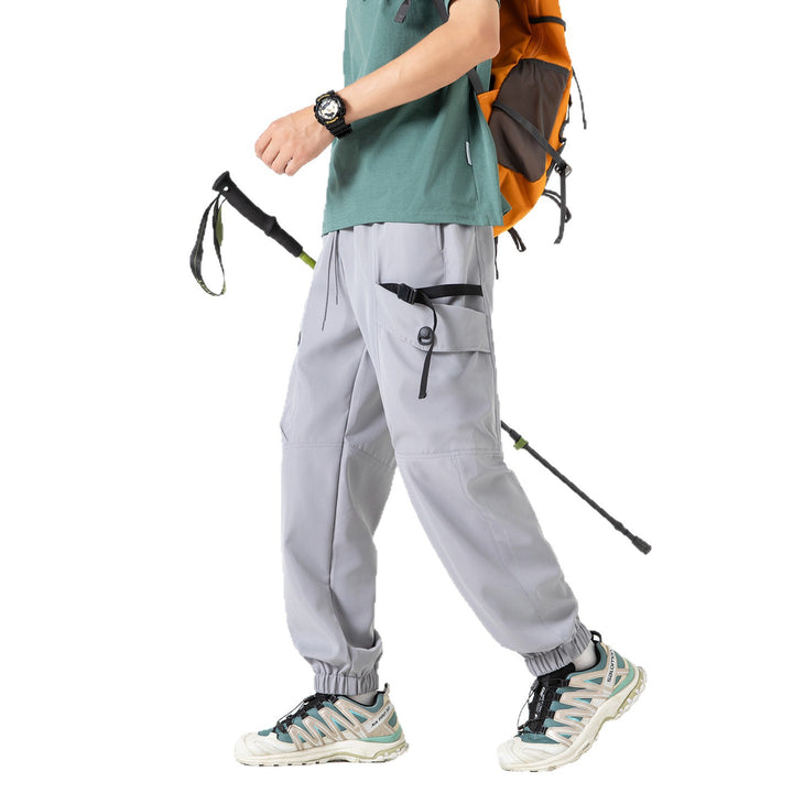 Unisex Wide Technical CargoJogging Pants with adjustable drawstring, large flap pockets, and elastic ankle cuffs Drune