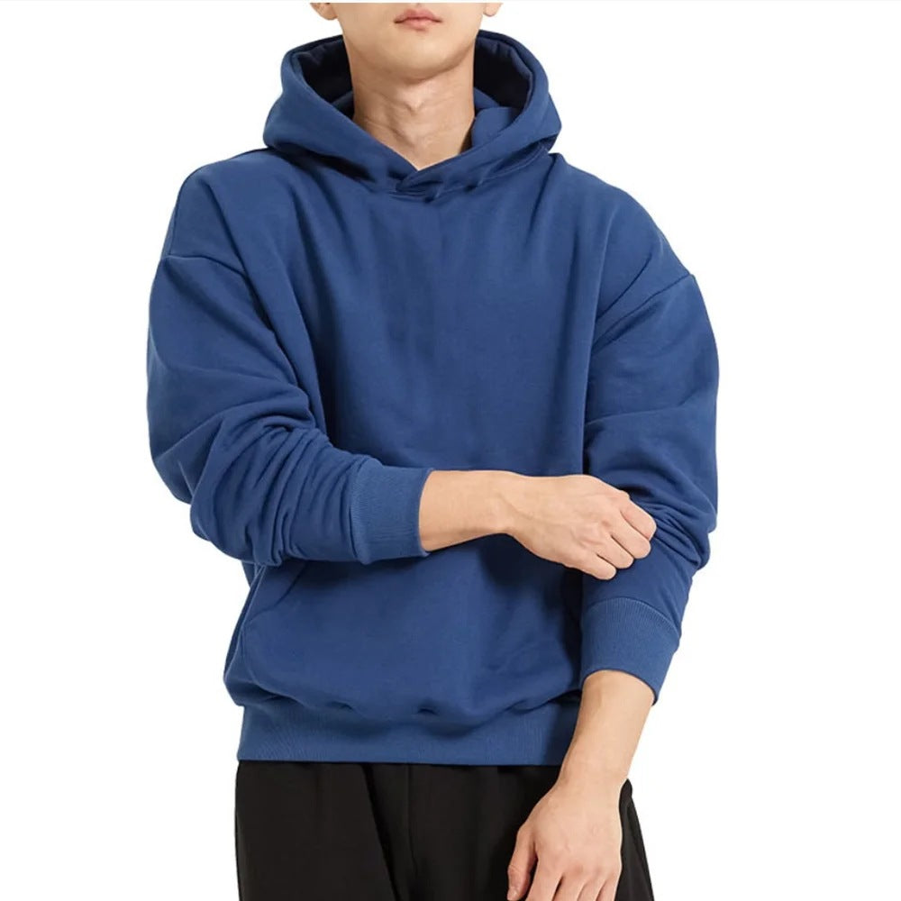 Men's heavy hooded sweatshirt in boxy cut with kangaroo pocket, ribbed hem, and soft brushed interior Mune Fashion