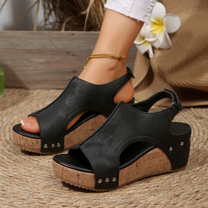 Women’s wedge sandals with heel strap, ergonomic footbed, cork look platform, and padded toe area Mune Fashion