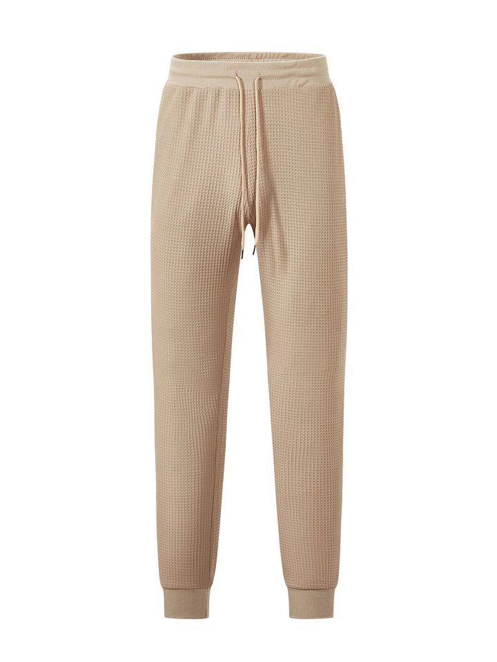 Men's fine-structured jersey lounge pants tapered cut with drawstring waistband and ribbed leg openings Mune Fashion