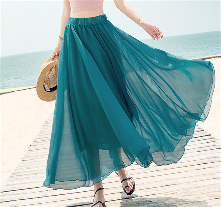 Women's flowing maxi skirt made of chiffon with elastic waistband and layered ruffle Mune Fashion