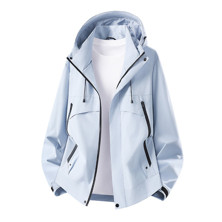 Women's lightweight waterproof hooded jacket with breathable coating, zippered pockets, and adjustable cuffs Mune Fashion