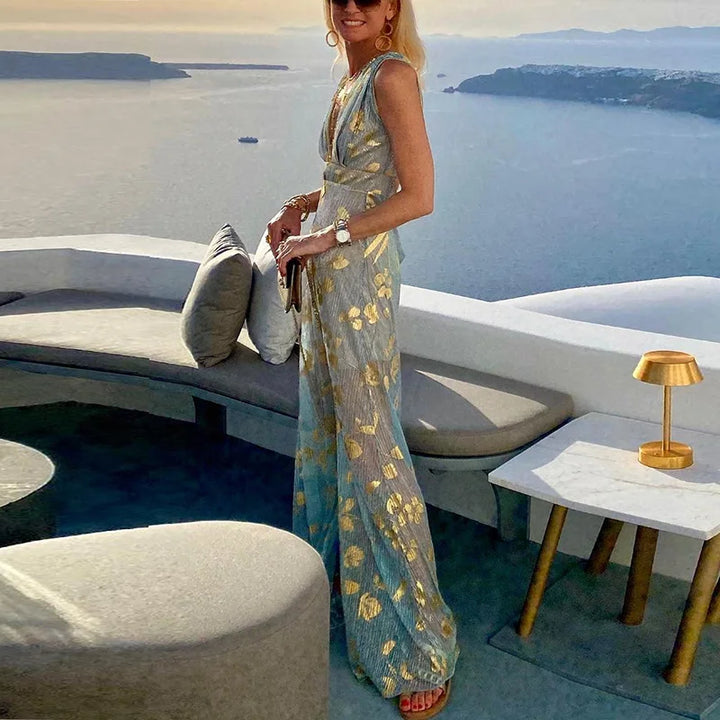 Flowing dress with V-neck and sequin embellishment