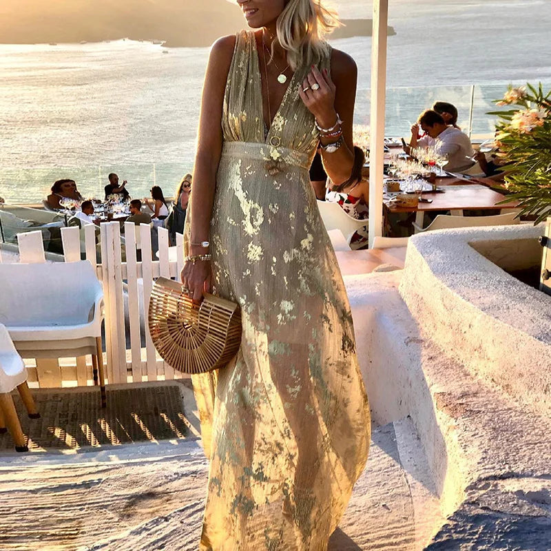 Flowing dress with V-neck and sequin embellishment