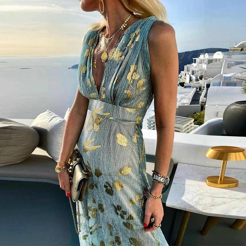 Flowing dress with V-neck and sequin embellishment