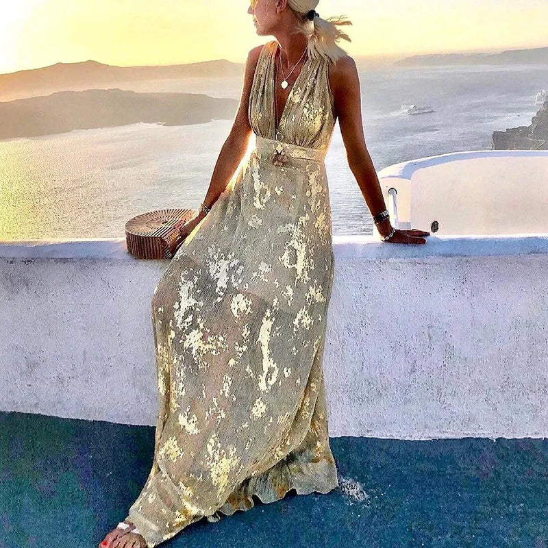 Flowing dress with V-neck and sequin embellishment