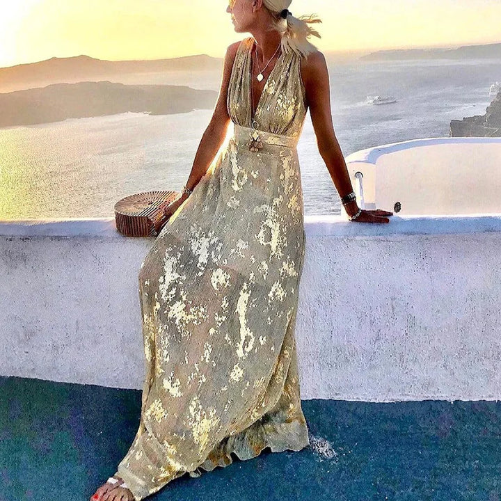 Flowing dress with V-neck and sequin embellishment
