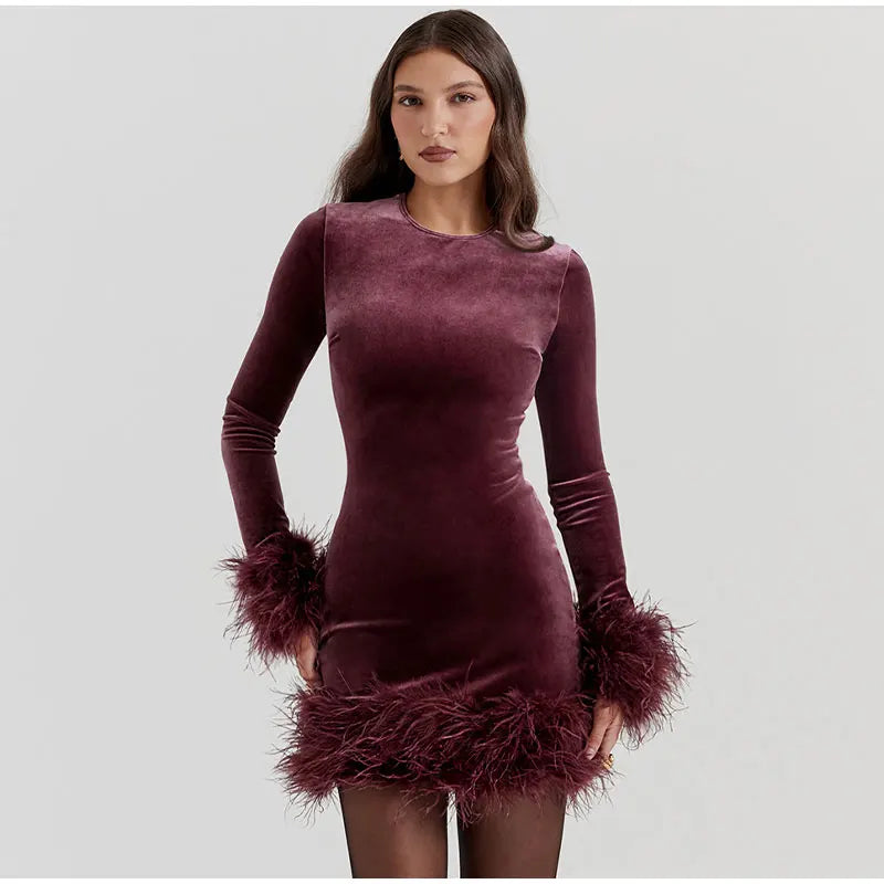 Mune | Elegant fitted dress with feather embellishments on the Sleeves