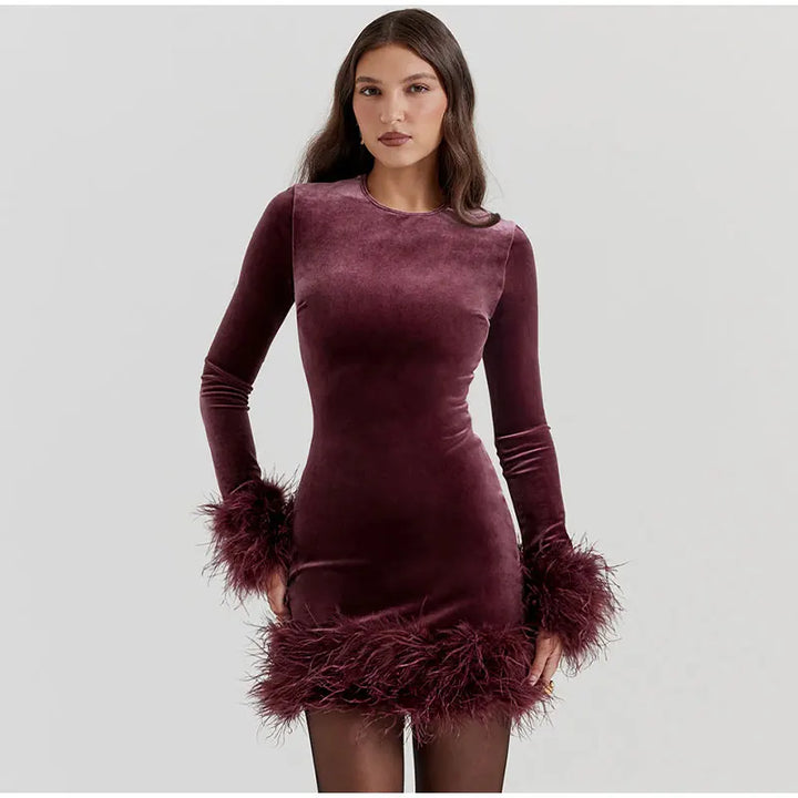 Mune | Elegant fitted dress with feather embellishments on the Sleeves