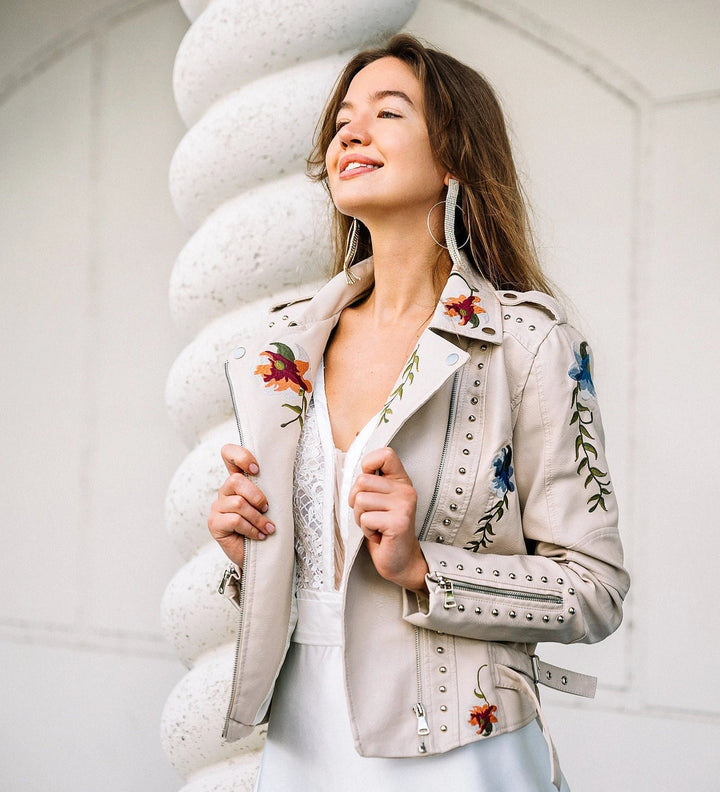 Mune | Women's leather jacket with stud accent and floral pattern
