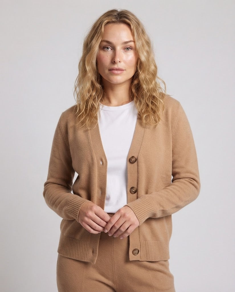 Women's fine-knit short cardigan with round neckline, fine ribbed edge, and subtly tailored silhouette Mune Fashion