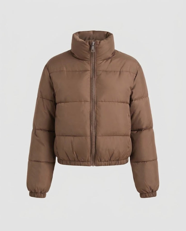 Ladies short padded quilted jacket with high stand-up collar and elastic cuffs Mune Fashion