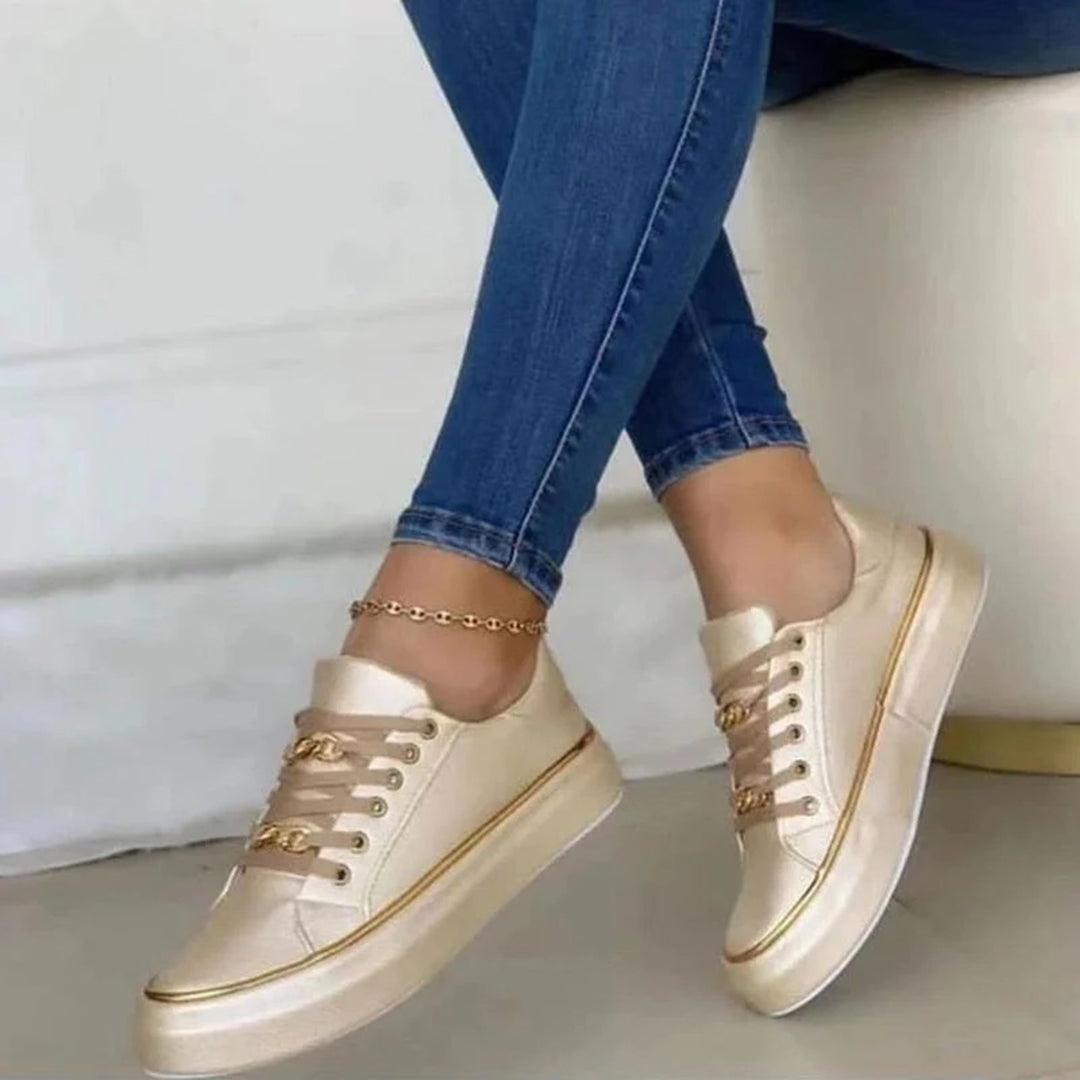 Women's sneakers with chic gold accent