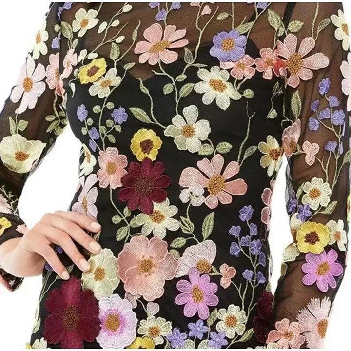 Mune | Mini dress with floral appliqués and transparent appearance
