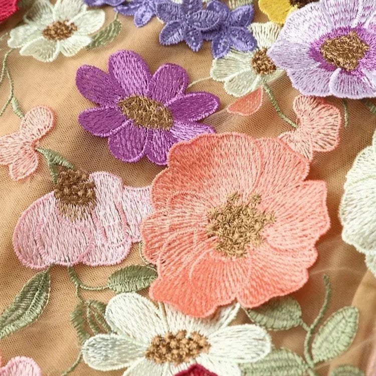 Mune | Mini Dress with Flower Applications and A Transparent Effect