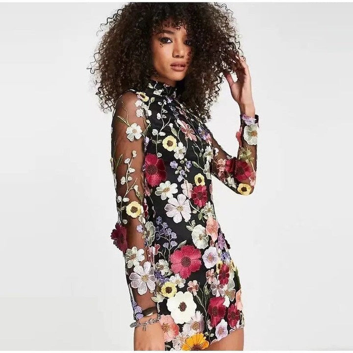 Mune | Mini dress with floral appliqués and transparent appearance