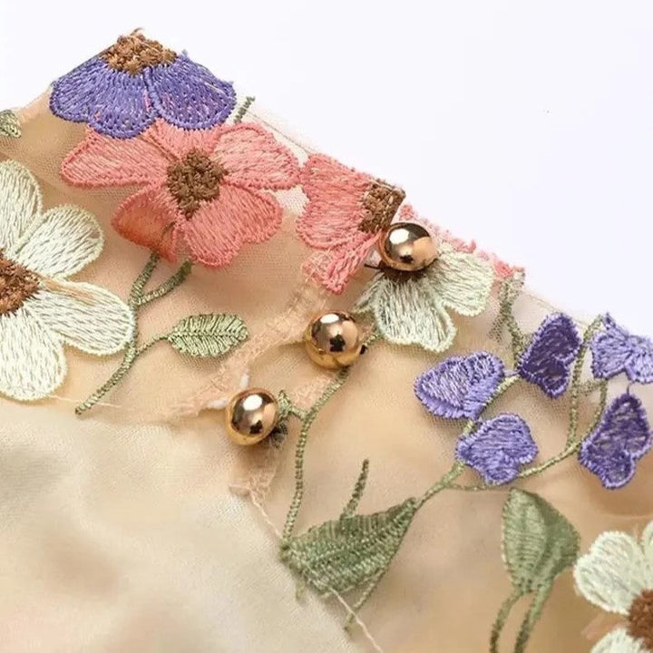 Mune | Mini Dress with Flower Applications and A Transparent Effect